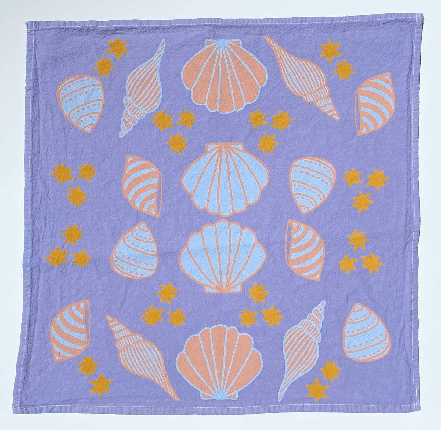 Magic Seashells Purple Tea Towel